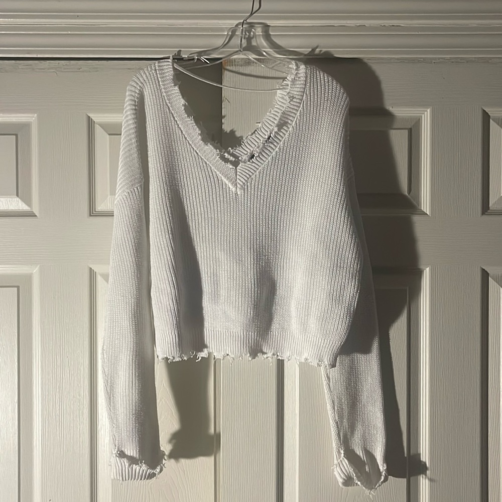 Slight used sweater. Great in the summer and winter.